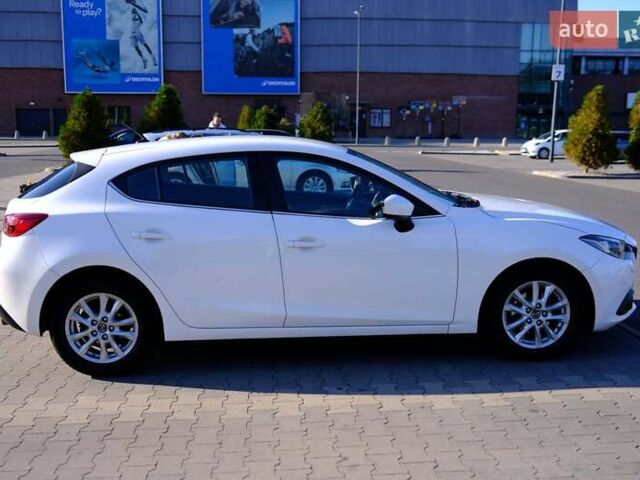 Білий Мазда 3, об'ємом двигуна 1.5 л та пробігом 74 тис. км за 14500 $, фото 4 на Automoto.ua