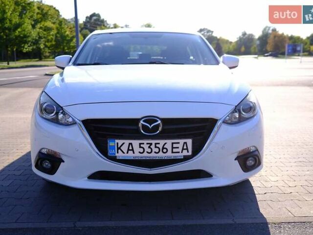 Білий Мазда 3, об'ємом двигуна 1.5 л та пробігом 74 тис. км за 14500 $, фото 1 на Automoto.ua