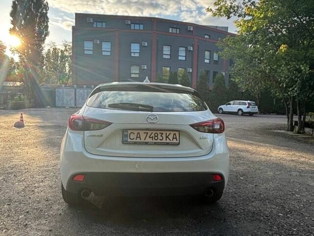 Білий Мазда 3, об'ємом двигуна 2 л та пробігом 76 тис. км за 11858 $, фото 10 на Automoto.ua