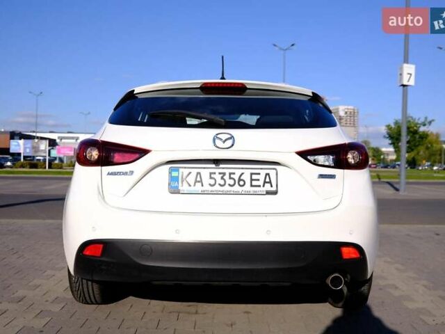 Білий Мазда 3, об'ємом двигуна 1.5 л та пробігом 74 тис. км за 14500 $, фото 3 на Automoto.ua