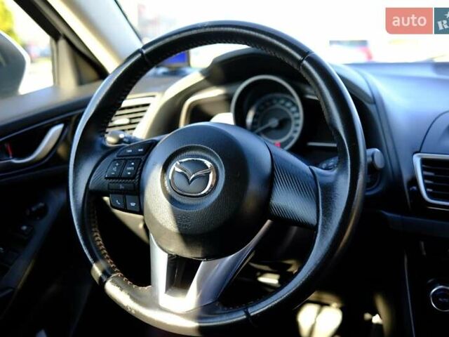 Білий Мазда 3, об'ємом двигуна 1.5 л та пробігом 74 тис. км за 14500 $, фото 9 на Automoto.ua
