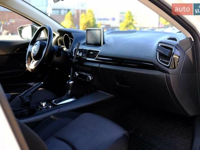 Білий Мазда 3, об'ємом двигуна 1.5 л та пробігом 74 тис. км за 14500 $, фото 6 на Automoto.ua