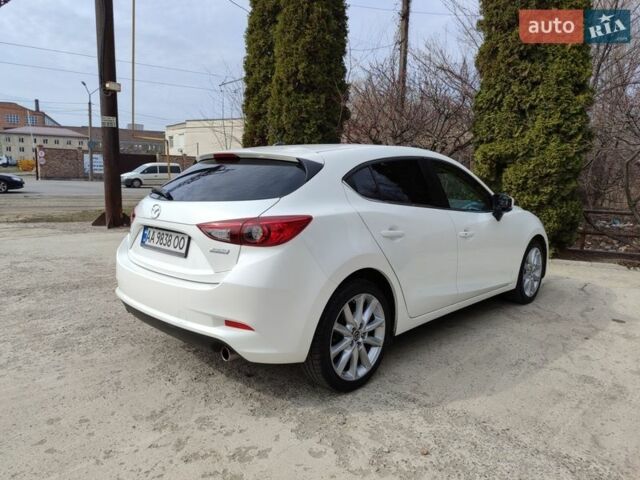 Білий Мазда 3, об'ємом двигуна 2.49 л та пробігом 105 тис. км за 13000 $, фото 13 на Automoto.ua