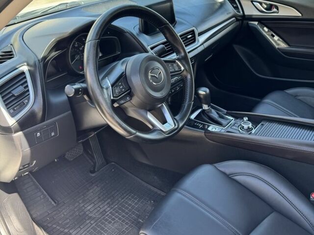 Білий Мазда 3, об'ємом двигуна 2 л та пробігом 130 тис. км за 11026 $, фото 10 на Automoto.ua