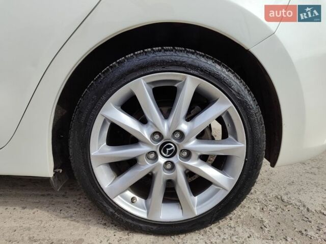 Білий Мазда 3, об'ємом двигуна 2.49 л та пробігом 105 тис. км за 13000 $, фото 27 на Automoto.ua