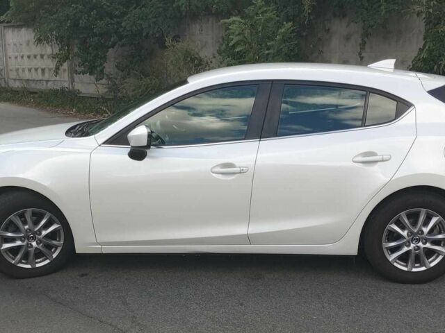 Білий Мазда 3, об'ємом двигуна 1.5 л та пробігом 115 тис. км за 14309 $, фото 5 на Automoto.ua