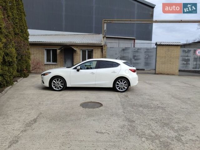 Білий Мазда 3, об'ємом двигуна 2.49 л та пробігом 105 тис. км за 13000 $, фото 19 на Automoto.ua