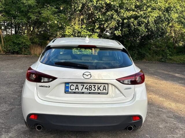 Білий Мазда 3, об'ємом двигуна 2 л та пробігом 76 тис. км за 12000 $, фото 6 на Automoto.ua