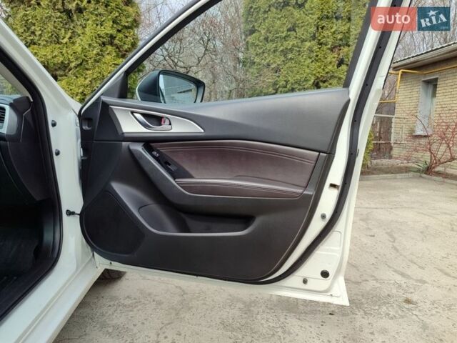 Білий Мазда 3, об'ємом двигуна 2.49 л та пробігом 105 тис. км за 13000 $, фото 15 на Automoto.ua