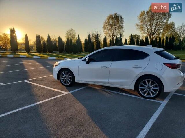 Белый Мазда 3, объемом двигателя 2.49 л и пробегом 86 тыс. км за 13700 $, фото 2 на Automoto.ua