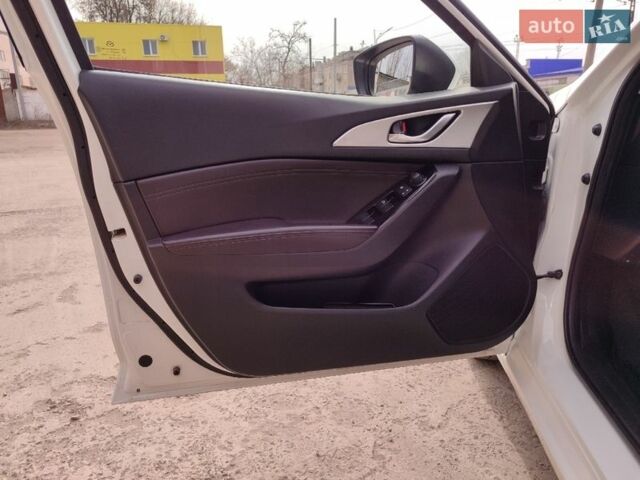 Білий Мазда 3, об'ємом двигуна 2.49 л та пробігом 105 тис. км за 13000 $, фото 10 на Automoto.ua