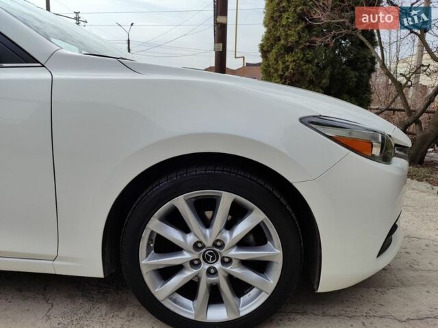 Білий Мазда 3, об'ємом двигуна 2.49 л та пробігом 105 тис. км за 13000 $, фото 25 на Automoto.ua