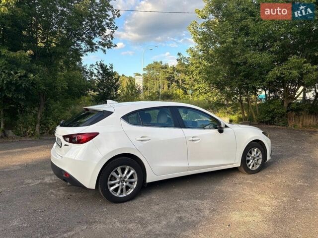 Білий Мазда 3, об'ємом двигуна 2 л та пробігом 76 тис. км за 12000 $, фото 16 на Automoto.ua