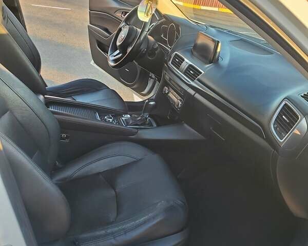 Белый Мазда 3, объемом двигателя 2.49 л и пробегом 86 тыс. км за 13700 $, фото 8 на Automoto.ua