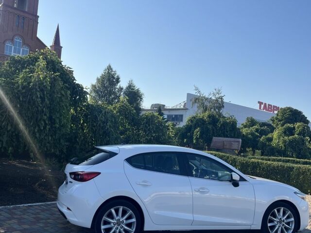 Белый Мазда 3, объемом двигателя 2 л и пробегом 154 тыс. км за 14950 $, фото 4 на Automoto.ua