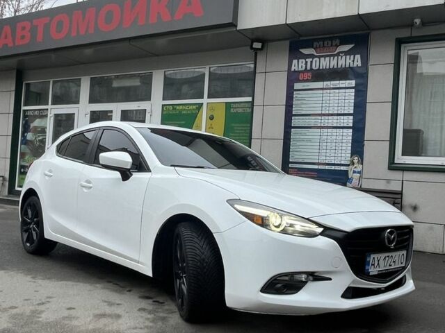 Білий Мазда 3, об'ємом двигуна 0.25 л та пробігом 58 тис. км за 14300 $, фото 2 на Automoto.ua