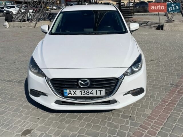 Белый Мазда 3, объемом двигателя 2 л и пробегом 106 тыс. км за 13500 $, фото 3 на Automoto.ua
