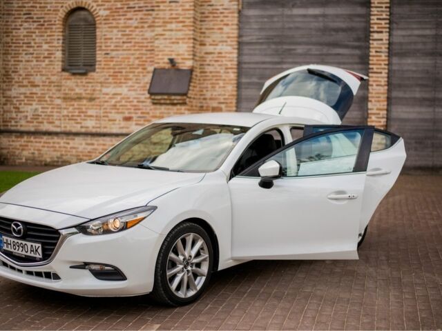Белый Мазда 3, объемом двигателя 2 л и пробегом 154 тыс. км за 14950 $, фото 1 на Automoto.ua