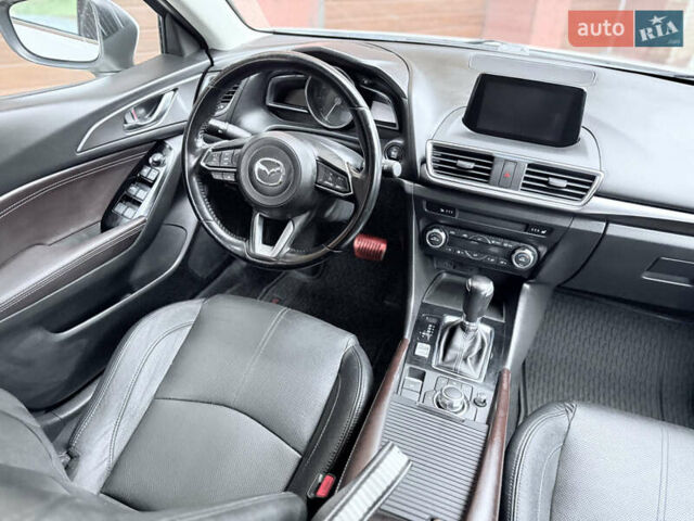 Белый Мазда 3, объемом двигателя 2.5 л и пробегом 139 тыс. км за 15500 $, фото 28 на Automoto.ua