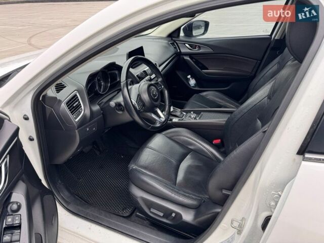 Белый Мазда 3, объемом двигателя 2.49 л и пробегом 102 тыс. км за 13000 $, фото 8 на Automoto.ua