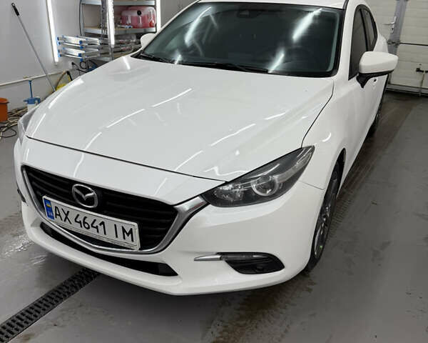 Белый Мазда 3, объемом двигателя 2.5 л и пробегом 120 тыс. км за 12900 $, фото 1 на Automoto.ua