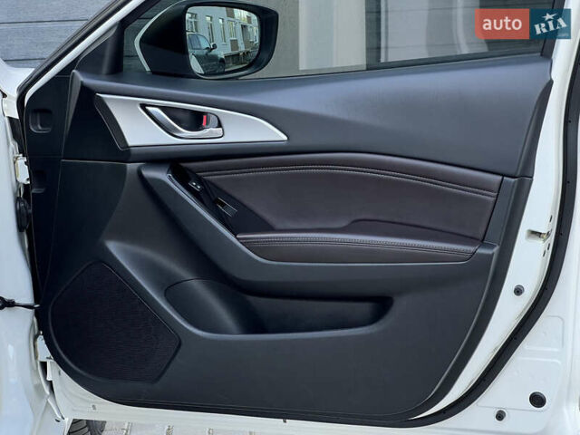 Білий Мазда 3, об'ємом двигуна 2.49 л та пробігом 81 тис. км за 14900 $, фото 13 на Automoto.ua