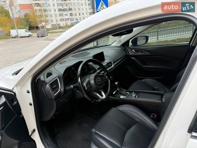 Білий Мазда 3, об'ємом двигуна 2.49 л та пробігом 97 тис. км за 12700 $, фото 12 на Automoto.ua