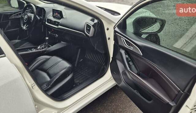 Білий Мазда 3, об'ємом двигуна 2.5 л та пробігом 95 тис. км за 11300 $, фото 13 на Automoto.ua