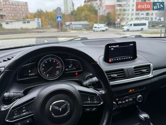 Білий Мазда 3, об'ємом двигуна 2.49 л та пробігом 97 тис. км за 12700 $, фото 13 на Automoto.ua