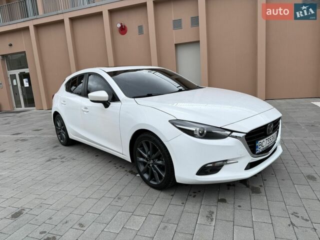 Білий Мазда 3, об'ємом двигуна 2.49 л та пробігом 97 тис. км за 12700 $, фото 7 на Automoto.ua