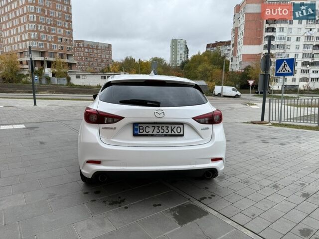 Білий Мазда 3, об'ємом двигуна 2.49 л та пробігом 97 тис. км за 12700 $, фото 4 на Automoto.ua