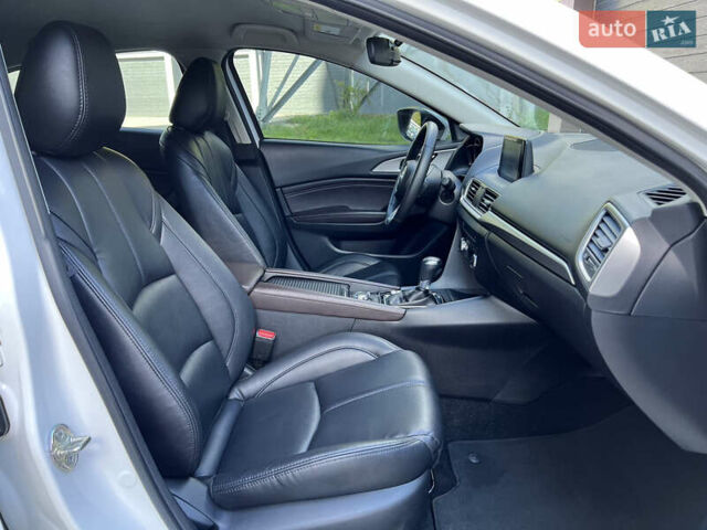 Білий Мазда 3, об'ємом двигуна 2.49 л та пробігом 81 тис. км за 14900 $, фото 12 на Automoto.ua