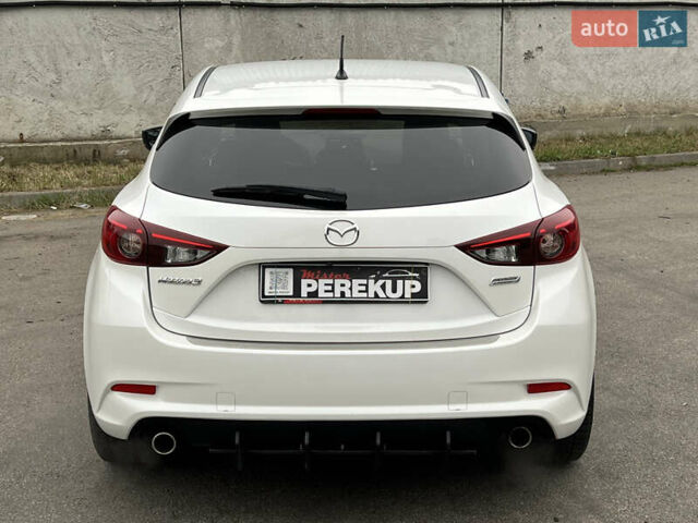 Белый Мазда 3, объемом двигателя 2.49 л и пробегом 91 тыс. км за 11999 $, фото 4 на Automoto.ua
