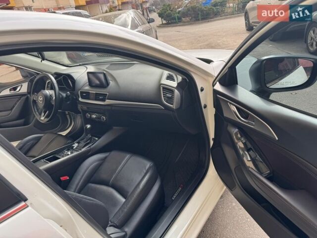 Білий Мазда 3, об'ємом двигуна 2.49 л та пробігом 71 тис. км за 15000 $, фото 17 на Automoto.ua