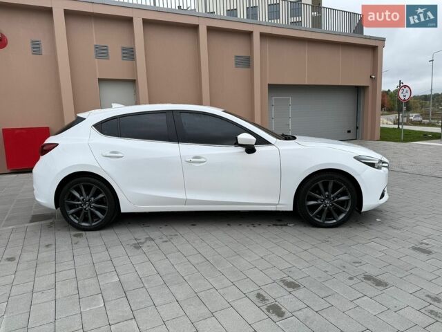 Білий Мазда 3, об'ємом двигуна 2.49 л та пробігом 97 тис. км за 12700 $, фото 6 на Automoto.ua