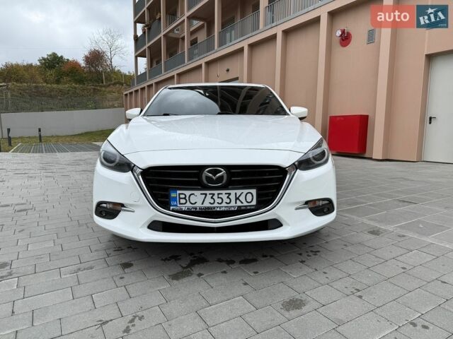 Білий Мазда 3, об'ємом двигуна 2.49 л та пробігом 97 тис. км за 12700 $, фото 2 на Automoto.ua