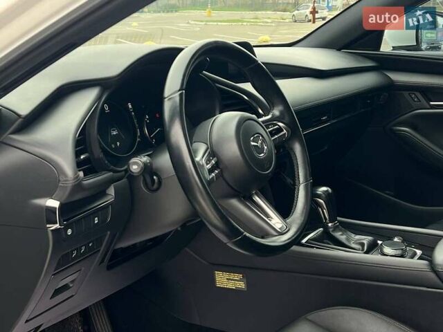 Білий Мазда 3, об'ємом двигуна 2.49 л та пробігом 85 тис. км за 15000 $, фото 12 на Automoto.ua