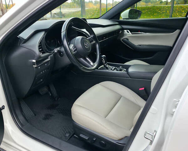 Мазда 3 2019 в Луцке на Automoto.ua Белый Мазда 3, объемом двигателя 2.49 л и пробегом 68 тыс. км за 14999 $, фото 12 на Automoto.ua
