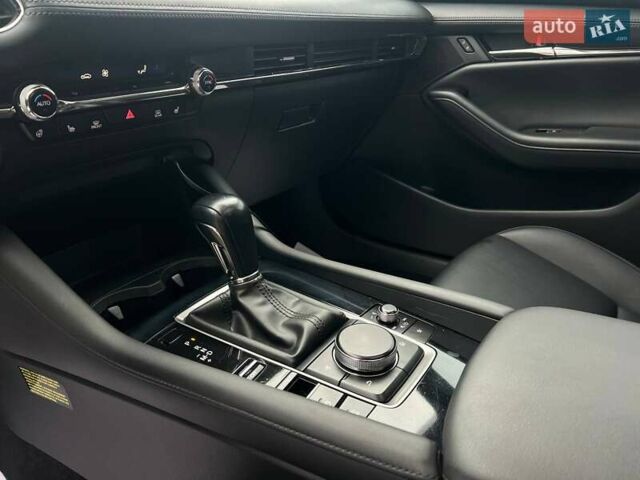 Білий Мазда 3, об'ємом двигуна 2.49 л та пробігом 85 тис. км за 15000 $, фото 18 на Automoto.ua