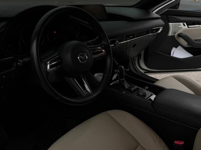 Білий Мазда 3, об'ємом двигуна 2.5 л та пробігом 143 тис. км за 16000 $, фото 4 на Automoto.ua