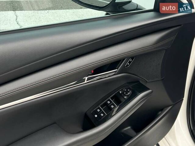 Білий Мазда 3, об'ємом двигуна 2.49 л та пробігом 85 тис. км за 15000 $, фото 10 на Automoto.ua