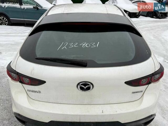 Білий Мазда 3, об'ємом двигуна 2.5 л та пробігом 93 тис. км за 10100 $, фото 14 на Automoto.ua