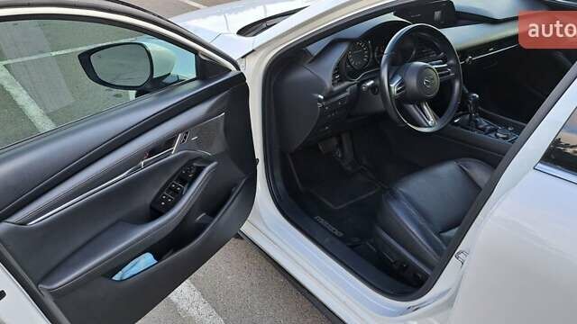 Белый Мазда 3, объемом двигателя 2.49 л и пробегом 57 тыс. км за 17990 $, фото 14 на Automoto.ua