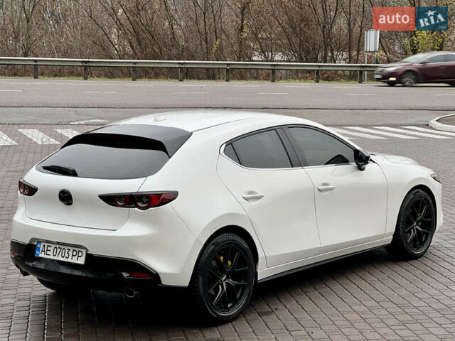 Білий Мазда 3, об'ємом двигуна 2.5 л та пробігом 81 тис. км за 16300 $, фото 4 на Automoto.ua