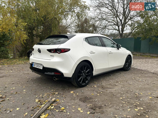 Білий Мазда 3, об'ємом двигуна 2.5 л та пробігом 97 тис. км за 18500 $, фото 3 на Automoto.ua