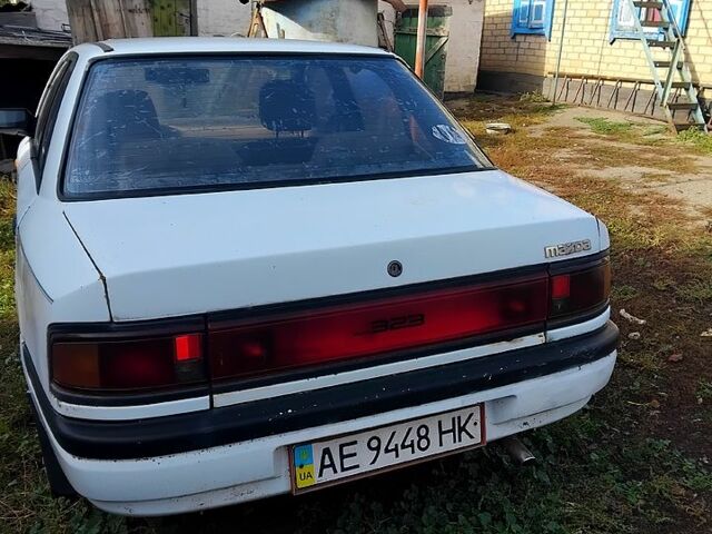 Белый Мазда 3, объемом двигателя 1.7 л и пробегом 300 тыс. км за 600 $, фото 5 на Automoto.ua