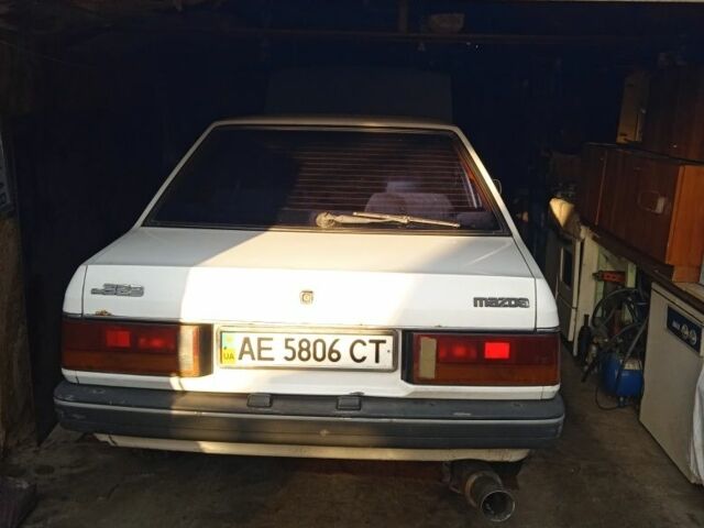 Белый Мазда 3, объемом двигателя 1.5 л и пробегом 333 тыс. км за 473 $, фото 6 на Automoto.ua