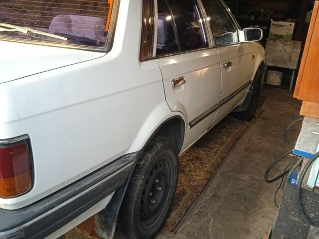 Белый Мазда 3, объемом двигателя 1.5 л и пробегом 333 тыс. км за 473 $, фото 2 на Automoto.ua