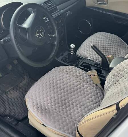 Белый Мазда 3, объемом двигателя 2 л и пробегом 213 тыс. км за 3500 $, фото 5 на Automoto.ua