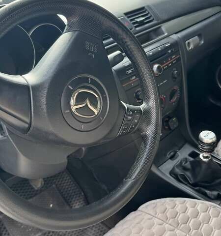 Белый Мазда 3, объемом двигателя 2 л и пробегом 213 тыс. км за 3500 $, фото 6 на Automoto.ua